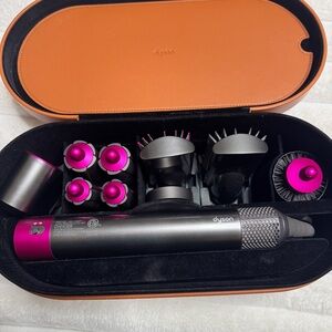 Dyson Hair Tool Set with Vibrant Pink Highlights